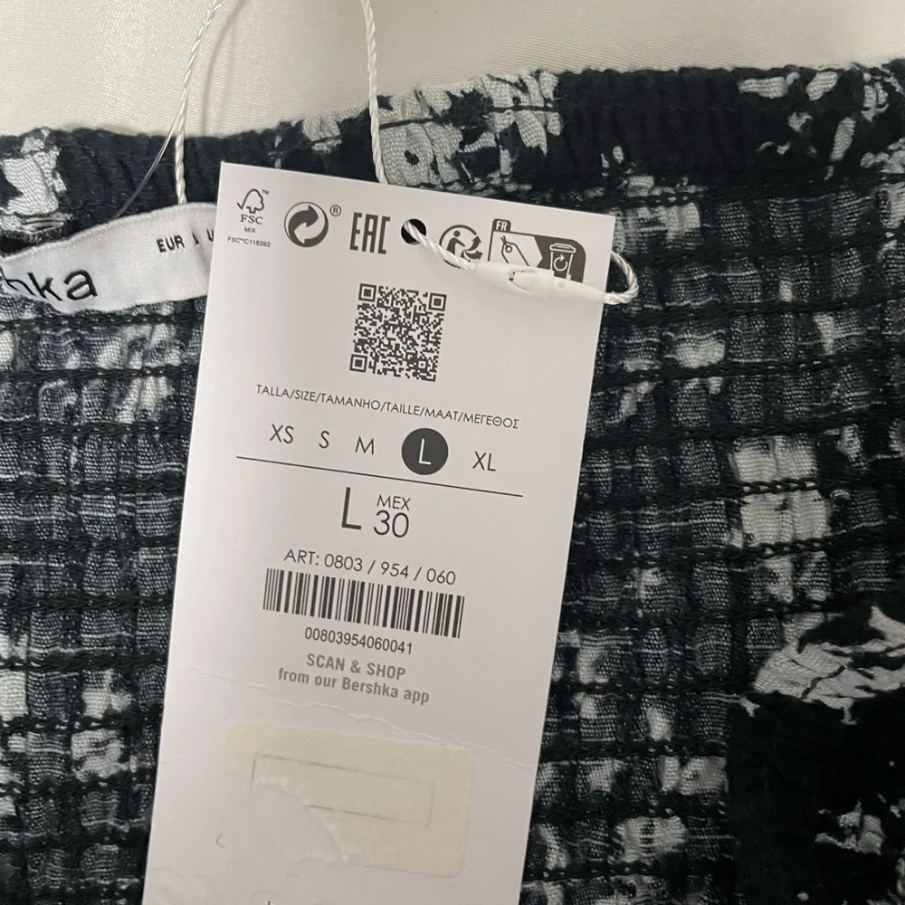 NWT Bershka shirred mini rara skort in black floral. Size Large